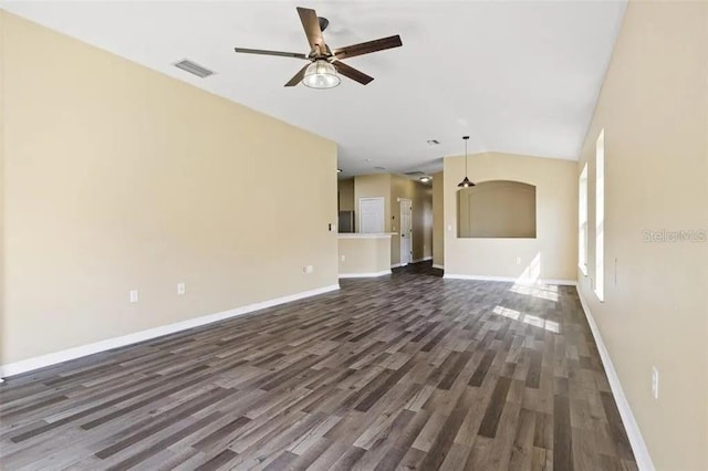 unfurnished living room featuring dark hardwood / wood-style floors and ceiling fan