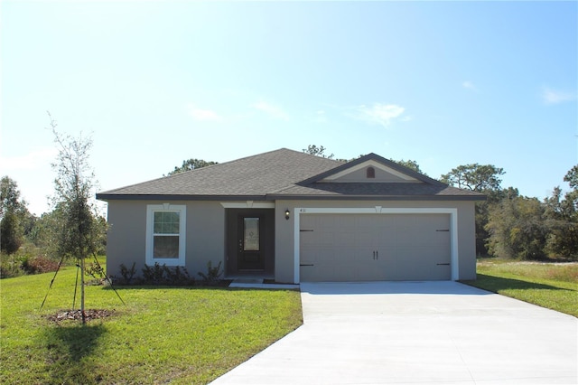 ranch-style home featuring a garage and a front lawn