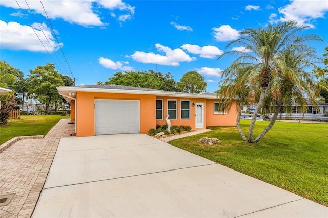 single story home with a front lawn and a garage