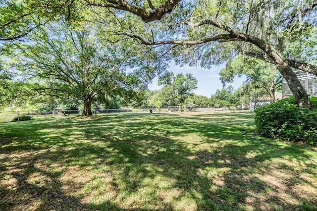 view of yard with fence