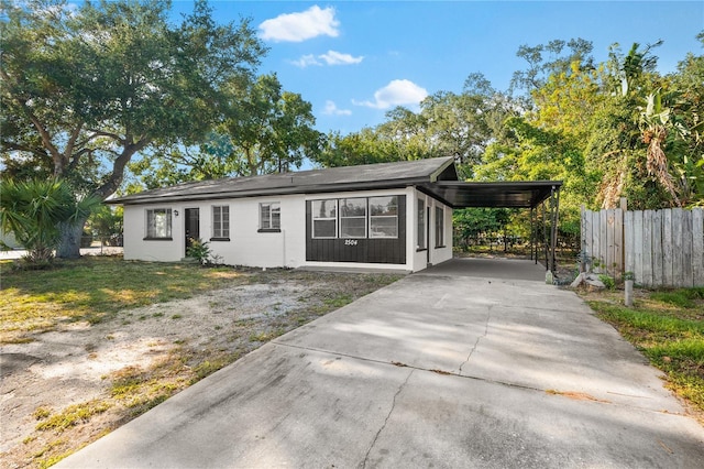 view of front of house with a carport