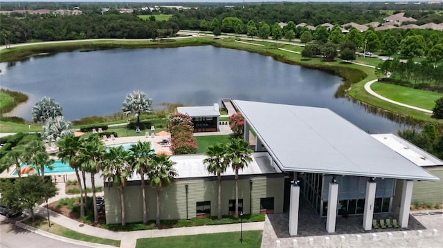 birds eye view of property with a water view