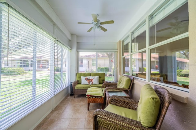 sunroom featuring plenty of natural light and ceiling fan