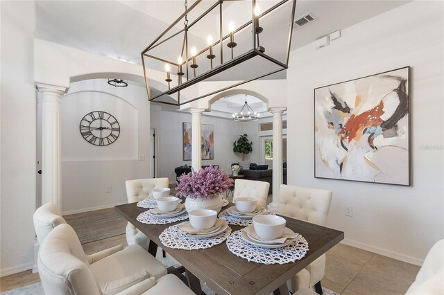 tiled dining room with decorative columns