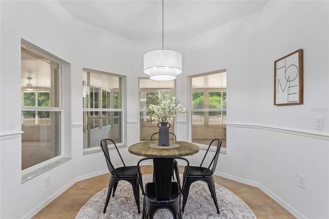 dining room with light tile flooring