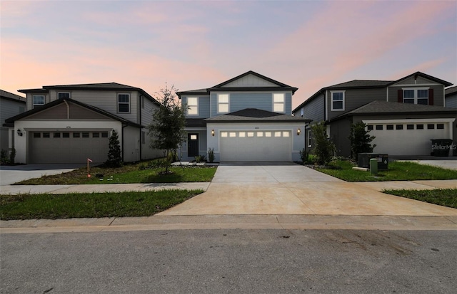 front facade with a garage