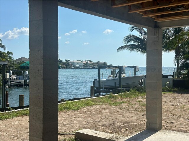 dock area with a water view