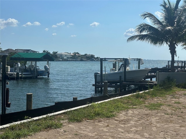 dock area featuring a water view