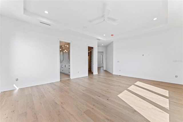 empty room featuring recessed lighting, visible vents, ceiling fan, and light wood-style floors