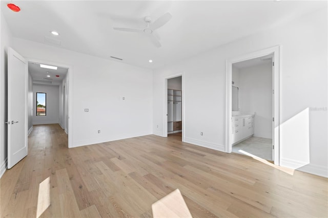 unfurnished bedroom featuring recessed lighting, light wood-type flooring, baseboards, and visible vents