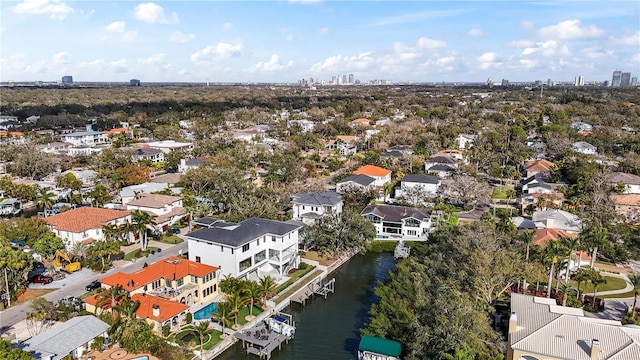 aerial view featuring a residential view and a water view