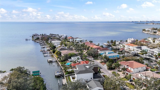 bird's eye view with a residential view and a water view