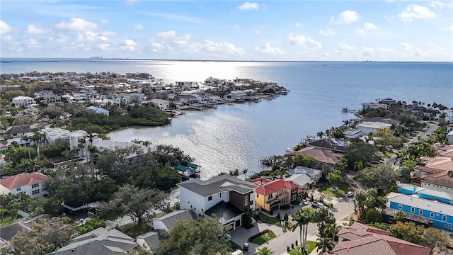 birds eye view of property featuring a residential view and a water view