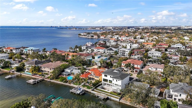 aerial view featuring a residential view and a water view