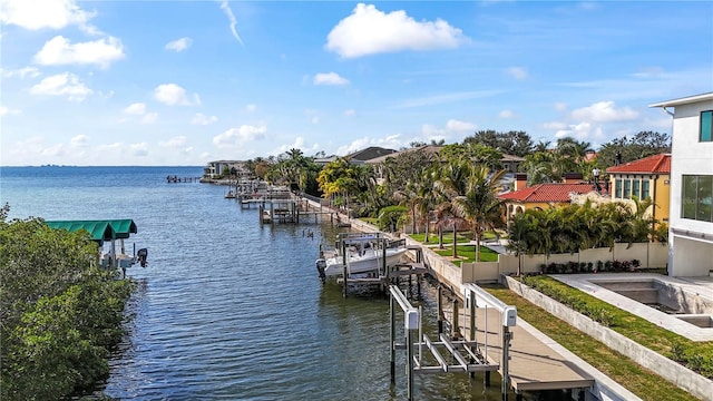 exterior space featuring boat lift and a boat dock