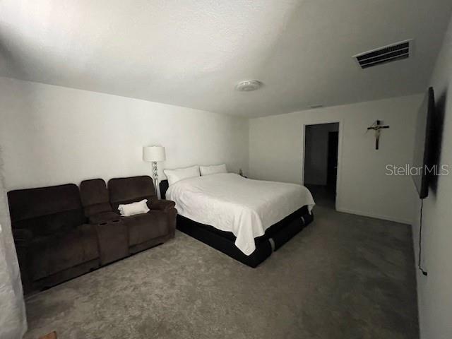 bedroom featuring carpet floors