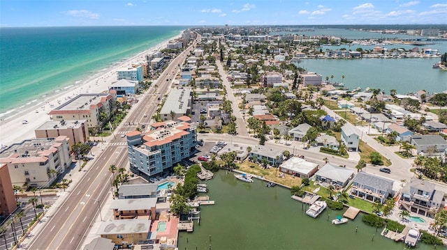 aerial view featuring a water view and a beach view
