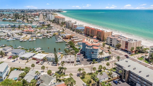 bird's eye view featuring a beach view and a water view