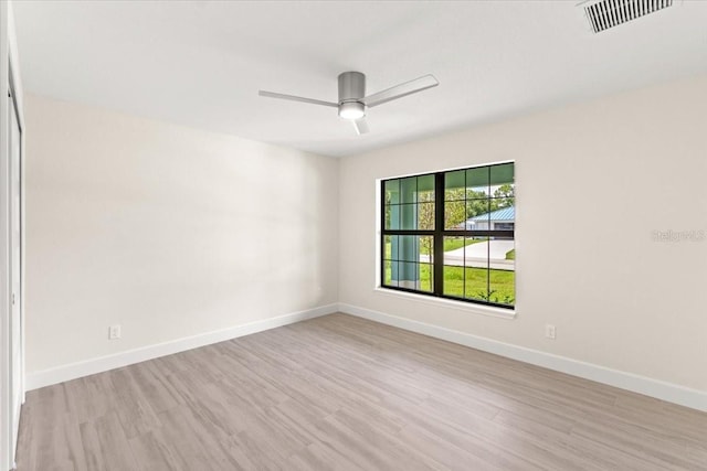 unfurnished room featuring ceiling fan and light hardwood / wood-style floors