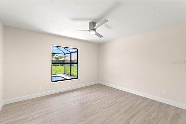 unfurnished room featuring ceiling fan and light hardwood / wood-style flooring