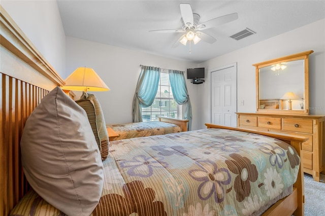 8545 Trail Wind Dr, Tampa, FL 33647 - carpeted bedroom featuring ceiling fan and a closet