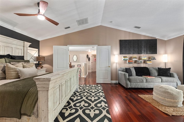 bedroom with ornamental molding, a textured ceiling, vaulted ceiling, ceiling fan, and dark hardwood / wood-style floors