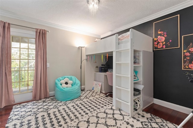 bedroom featuring hardwood / wood-style floors, a textured ceiling, and ornamental molding