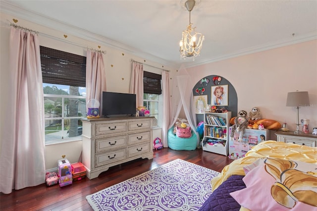 bedroom featuring crown molding, dark wood-type flooring, and a notable chandelier