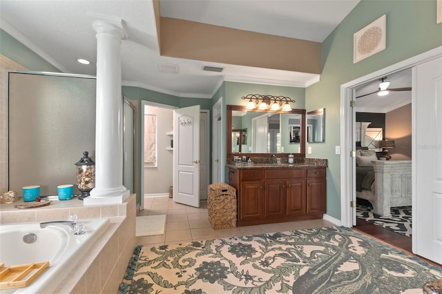 bathroom featuring ceiling fan, decorative columns, tile patterned floors, crown molding, and vanity