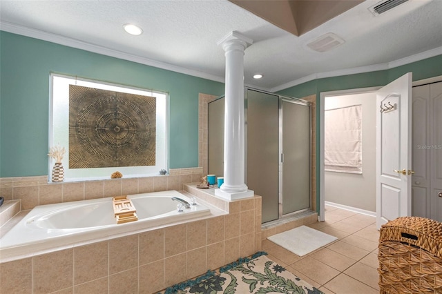 bathroom with tile patterned flooring, ornamental molding, shower with separate bathtub, and a textured ceiling