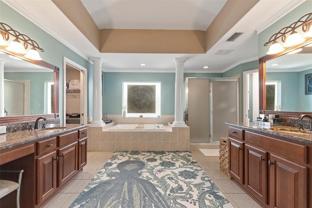 bathroom with tile patterned flooring, vanity, crown molding, and plus walk in shower