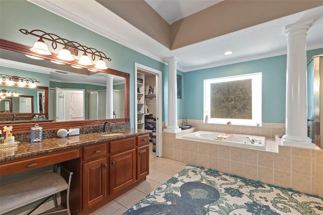 bathroom featuring tile patterned flooring, vanity, independent shower and bath, and crown molding