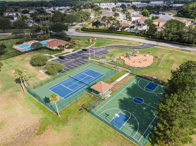 birds eye view of property featuring a water view