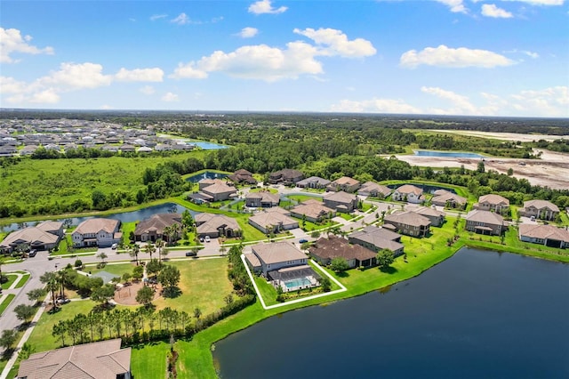 drone / aerial view featuring a water view