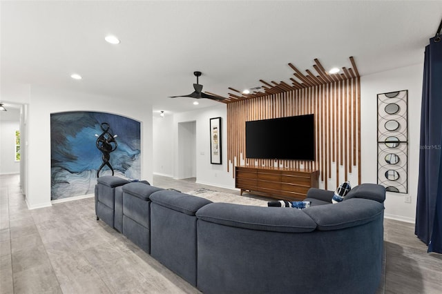 living room featuring ceiling fan