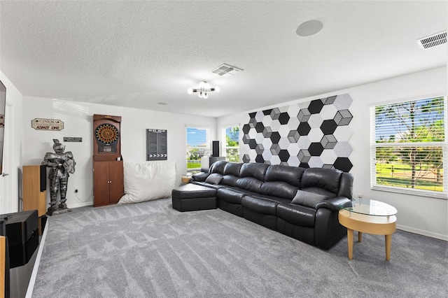 living room featuring light colored carpet and a textured ceiling