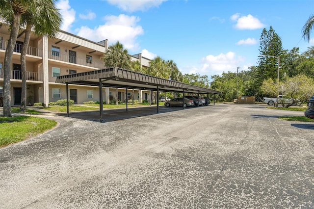 view of car parking with a carport