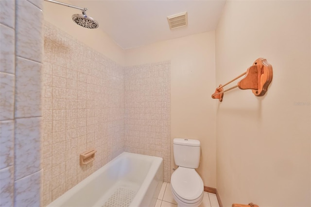 bathroom featuring toilet and tile patterned flooring