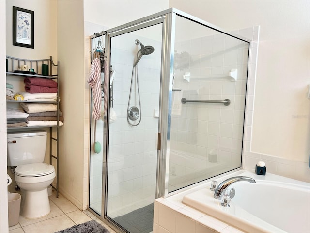 bathroom with tile patterned floors, toilet, and plus walk in shower