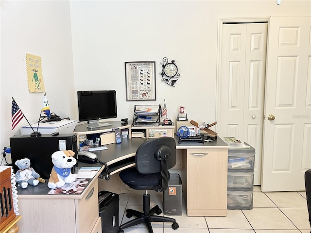 home office featuring light tile patterned flooring