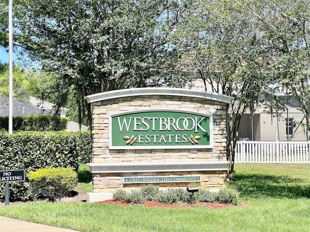 view of community sign