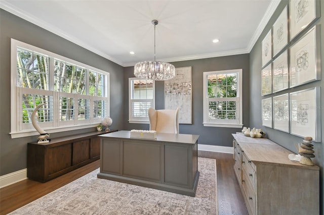 office space featuring dark hardwood / wood-style flooring, crown molding, and an inviting chandelier