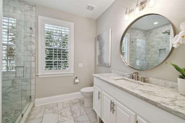 bathroom with tile flooring, a shower with shower door, toilet, and large vanity