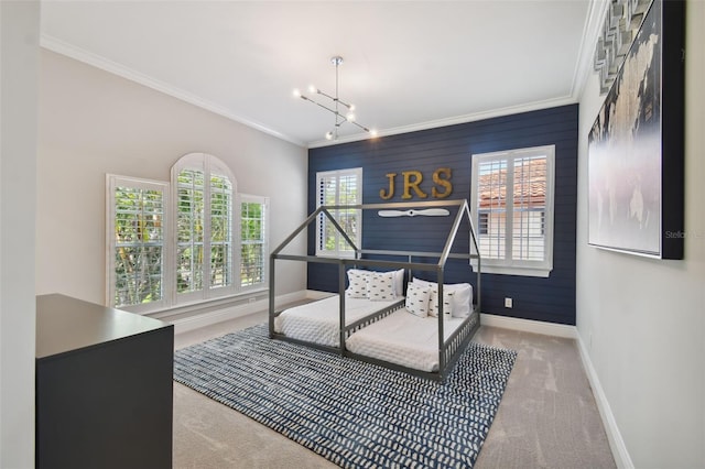 office area featuring an inviting chandelier, light carpet, and ornamental molding