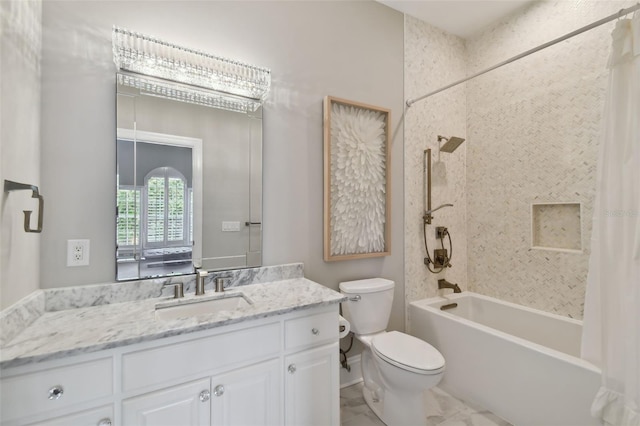 full bathroom with tile floors, shower / tub combo, vanity, and toilet