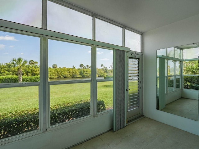 unfurnished sunroom with plenty of natural light