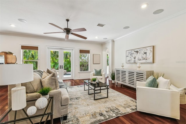 living area featuring french doors, wood finished floors, visible vents, and a healthy amount of sunlight