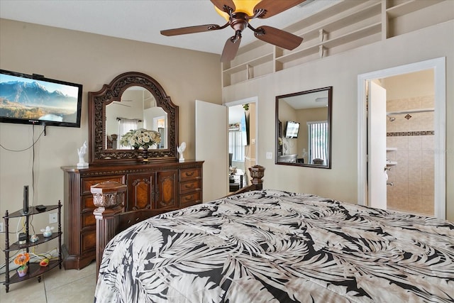 tiled bedroom featuring connected bathroom and ceiling fan