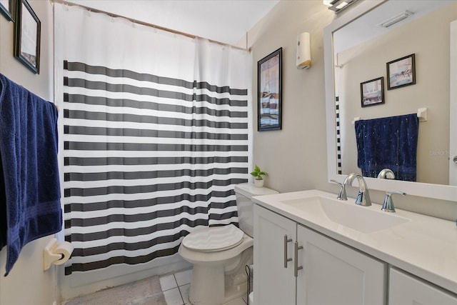 full bathroom with tile patterned floors, vanity, toilet, and shower / bath combo with shower curtain