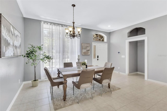 805 Woodcarver Ln, Brandon, FL 33510 - dining room featuring a chandelier, crown molding, light tile patterned flooring, and recessed lighting